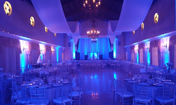 Blue up-lighting including stage draping
