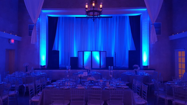 Stage backdrop with draping and back lighting