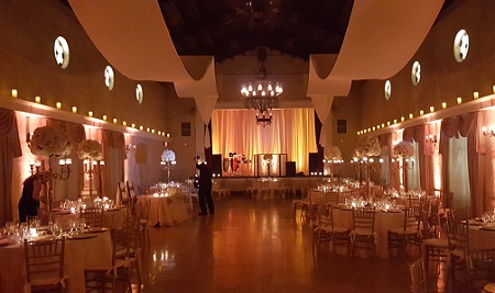 Amber up-lighting with stage draping