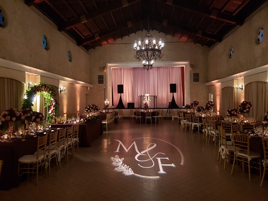Stage backdrop with draping and back lighting